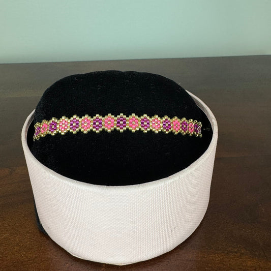 Bracelet with pink and purple beads