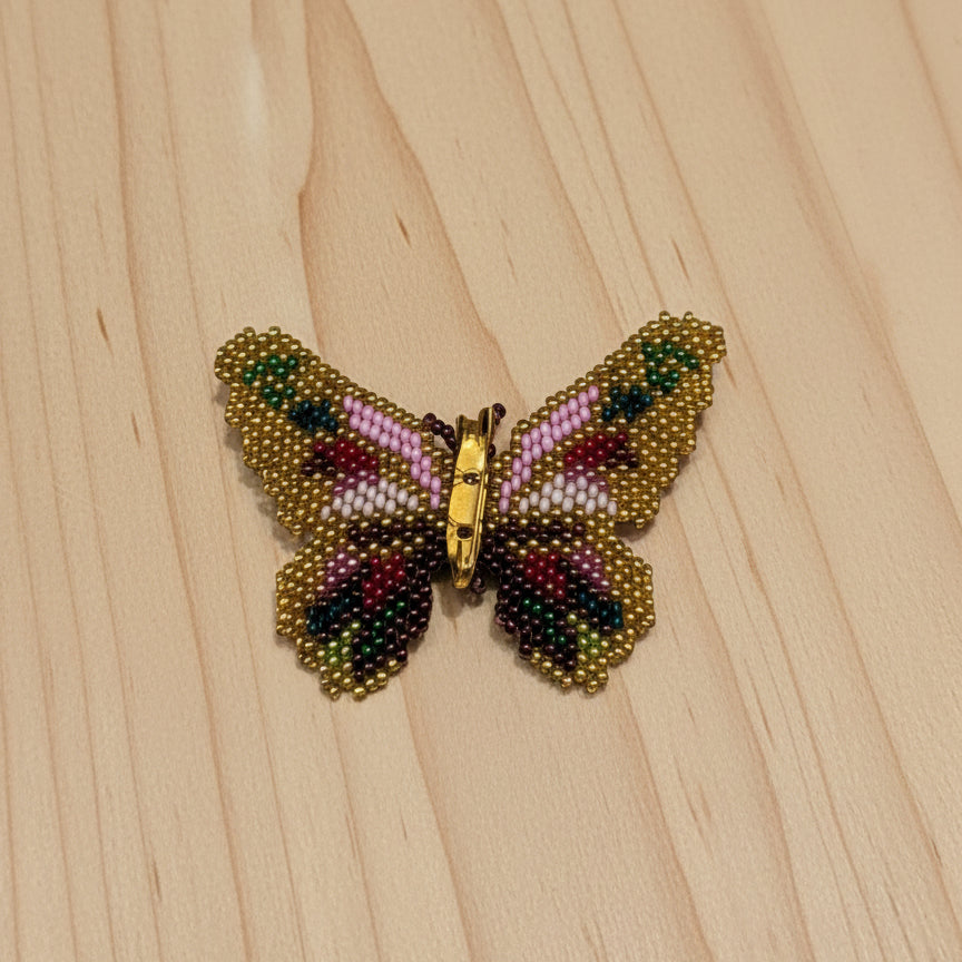 Beaded butterfly brooch 
