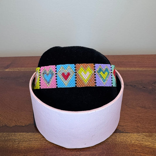 Colourful hand woven beaded miyuki bracelet with heart patterns