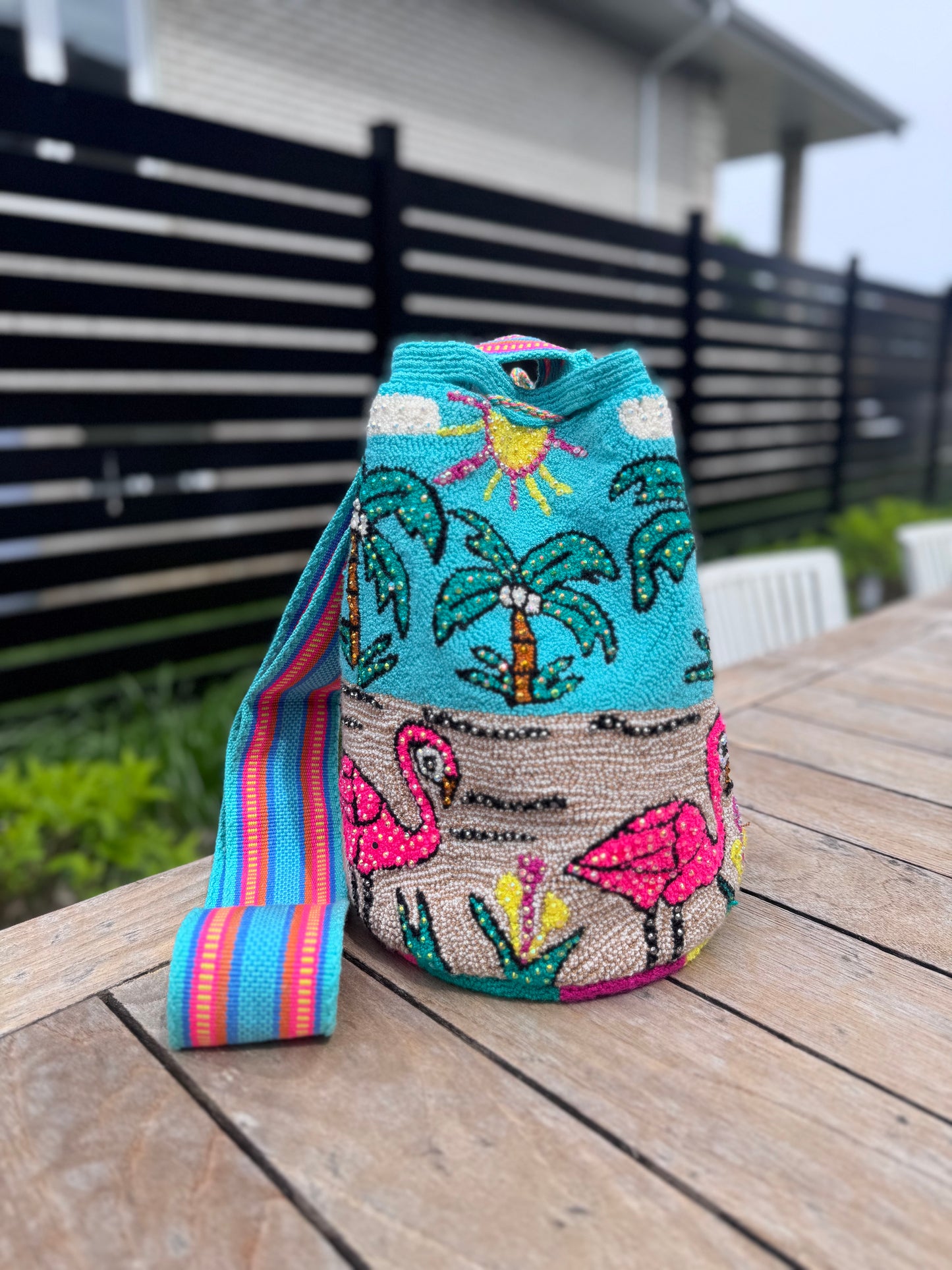 handwoven mochila bag in flamingo design  with tassels, handwoven in Colombia available in Montreal, Colombian traditional bag Montreal 