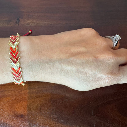 hand woven miyuki beaded bracelet red and gold colours with  adjustable strap 