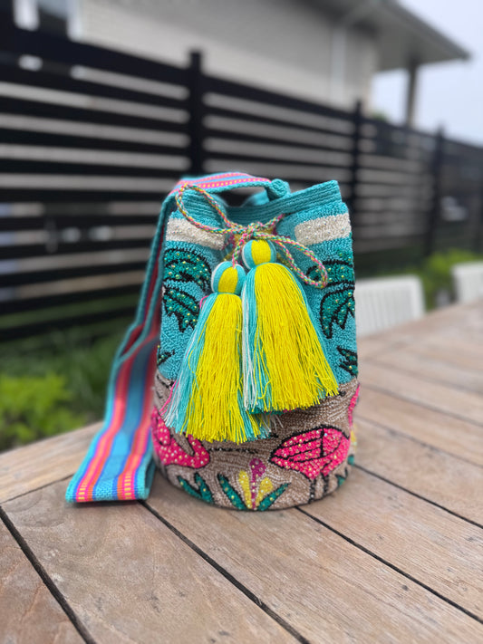 handwoven mochila bag in flamingo design  with tassels, handwoven in Colombia available in Montreal, Colombian traditional bag Montreal 