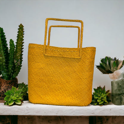 hand-woven in natural fibre, cube bag is light weight, versatile and easy to wear, durable material and spacious Montreal