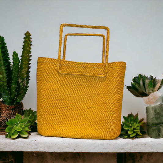 hand-woven in natural fibre, cube bag is light weight, versatile and easy to wear, durable material and spacious Montreal