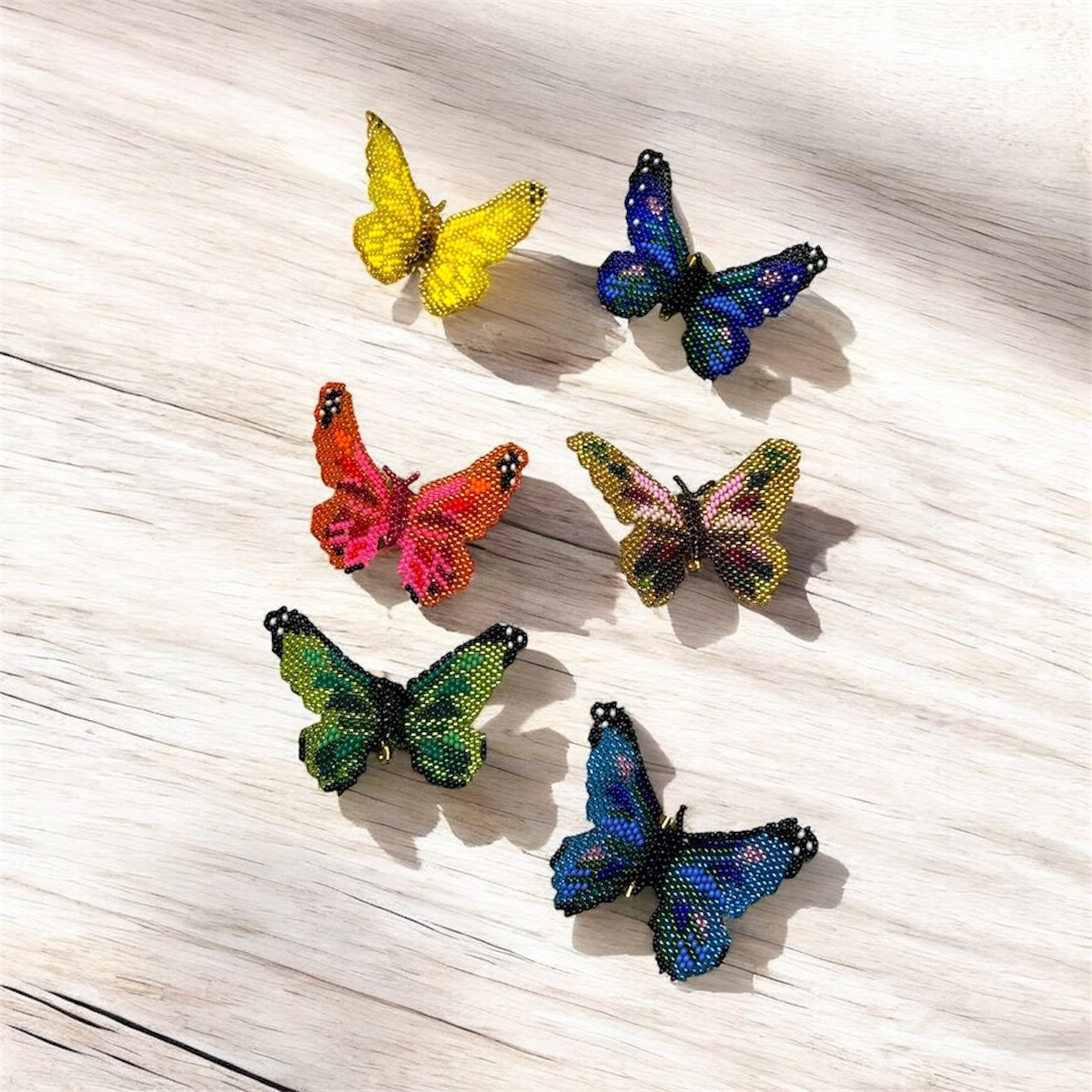 Colorful butterfly-shaped pins