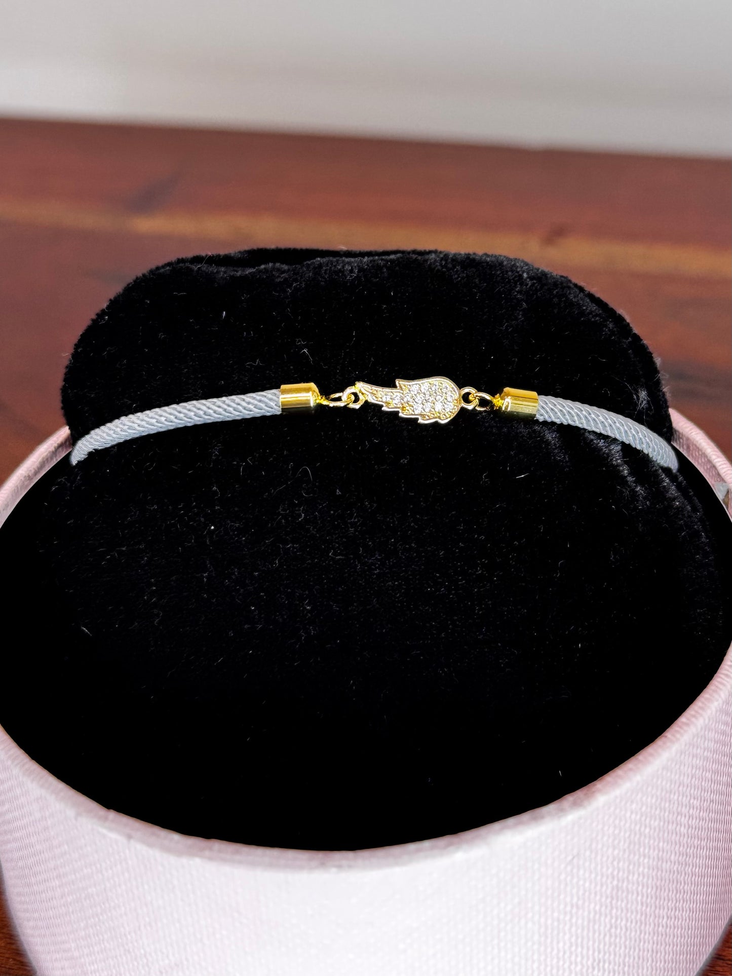 Bracelet with wing charm