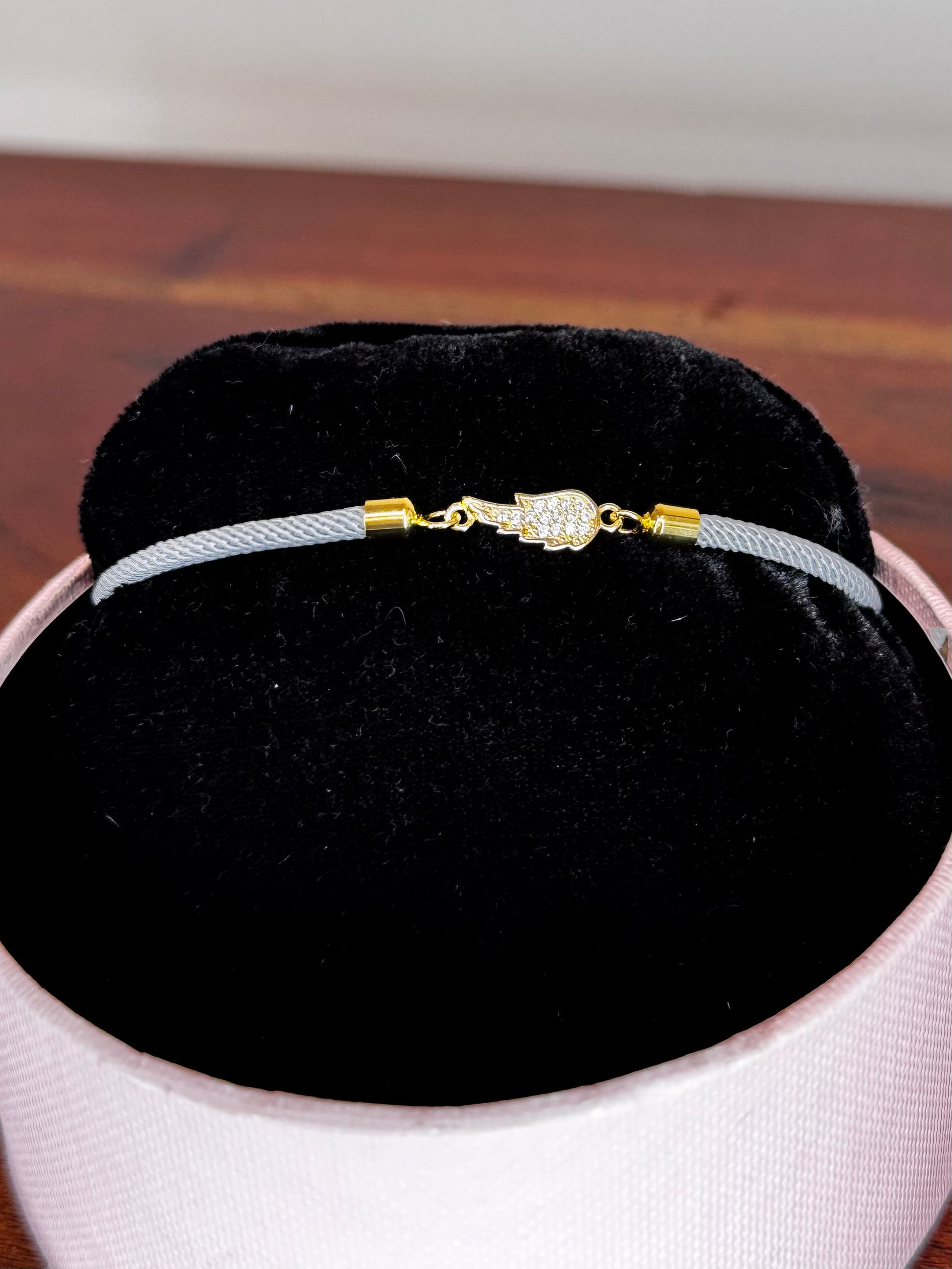 Bracelet with wing charm